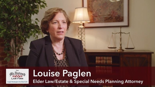 Louise Paglen with client at office